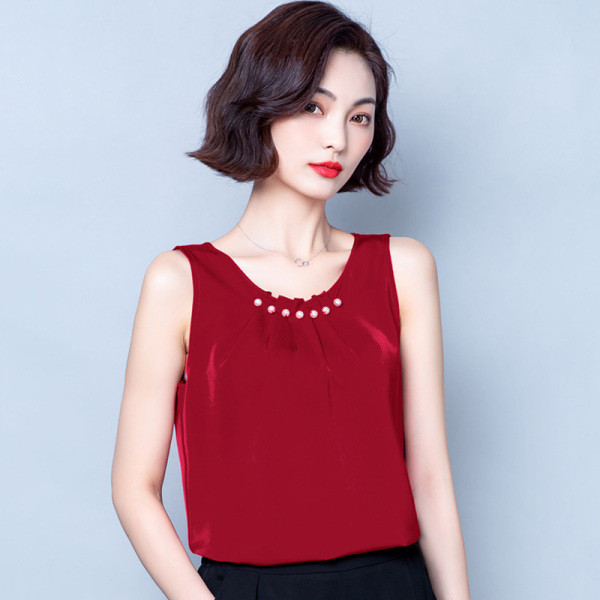 Moodne ümara dekoltee ja pärlitega naiste topp