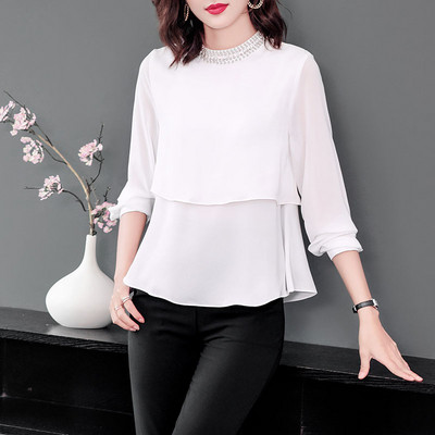 Moodne naiste pikkade varrukate ja pärlitega pluus