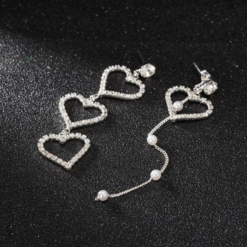 Κομψά γυναικεία κρεμαστά σκουλαρίκια με καρδιές