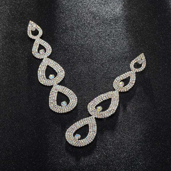 Naiste elegantsed rippuvad kivikestega kõrvarõngad