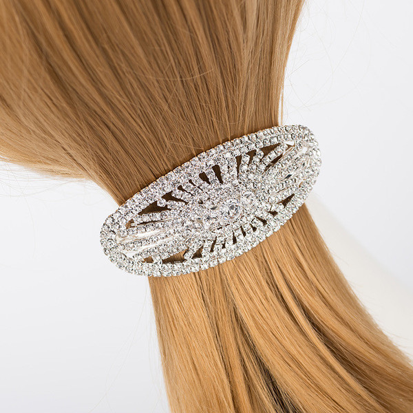 Elegantiškas plaukų segtukas su akmenukais