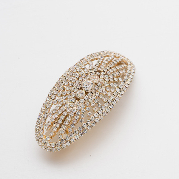 Elegantiškas plaukų segtukas su akmenukais