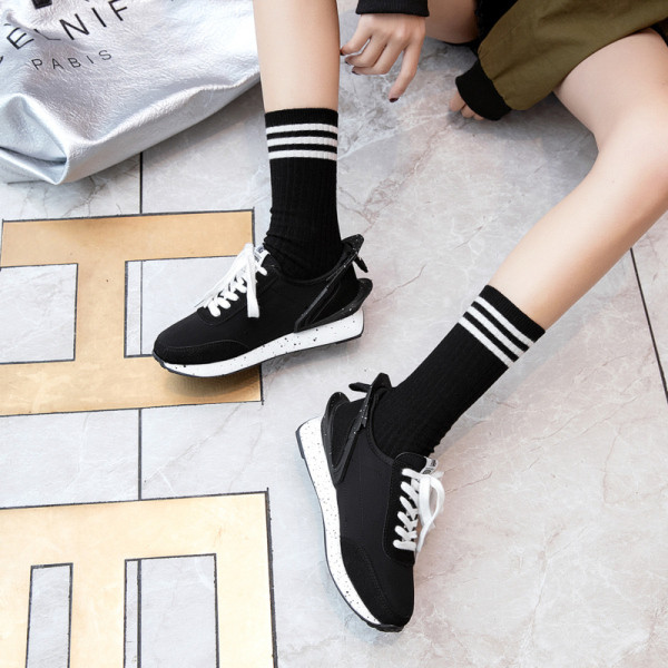 Öko-nahast ja tekstiilist paeltega naiste vabaaja tossud