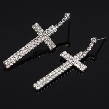 Γυναικεία κομψά κρέμονται σκουλαρίκια σε σχήμα σταυρού