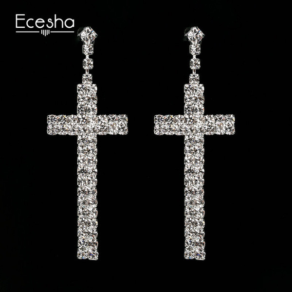 Γυναικεία κομψά κρέμονται σκουλαρίκια σε σχήμα σταυρού