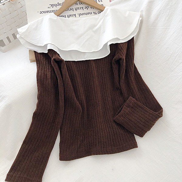 Moodne naiste musta, pruuni ja beeži pluus ovaalse kaelusega