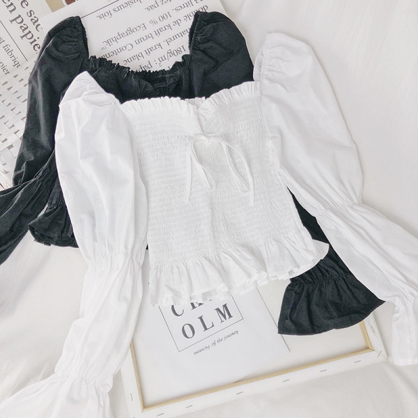 Naiste kollane, must ja valge lipsudega pluus