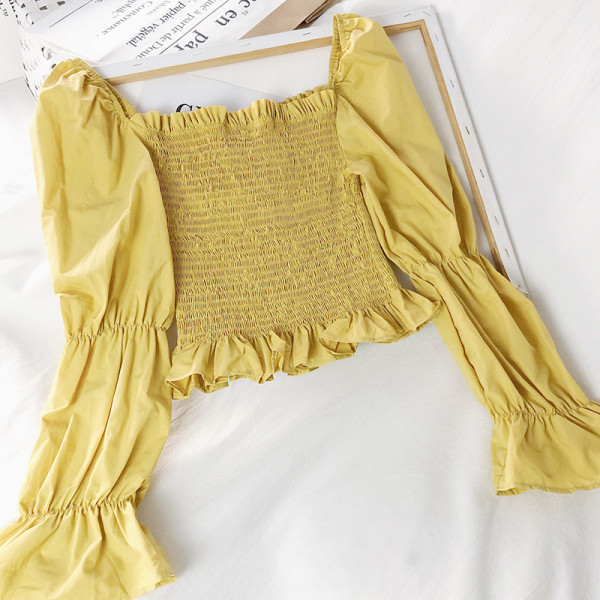 Naiste kollane, must ja valge lipsudega pluus