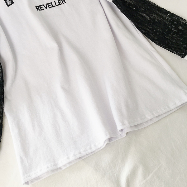 Ženska ležerna bluza s ovalnim izrezom i natpisima