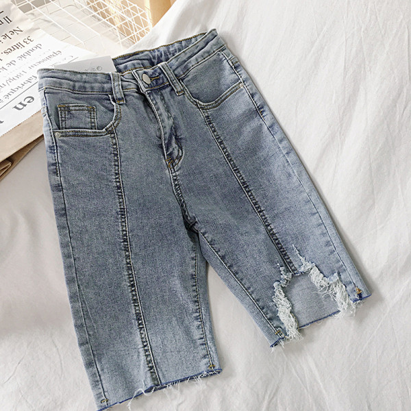 Női farmernadrág 3/4 hosszban, szakadt motívumokkal