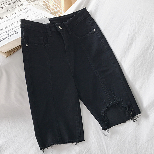 Női farmernadrág 3/4 hosszban, szakadt motívumokkal