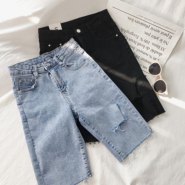 Női nadrág 3/4 hosszban, szakadt motívumokkal, két színben