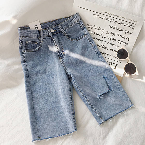 Női nadrág 3/4 hosszban, szakadt motívumokkal, két színben