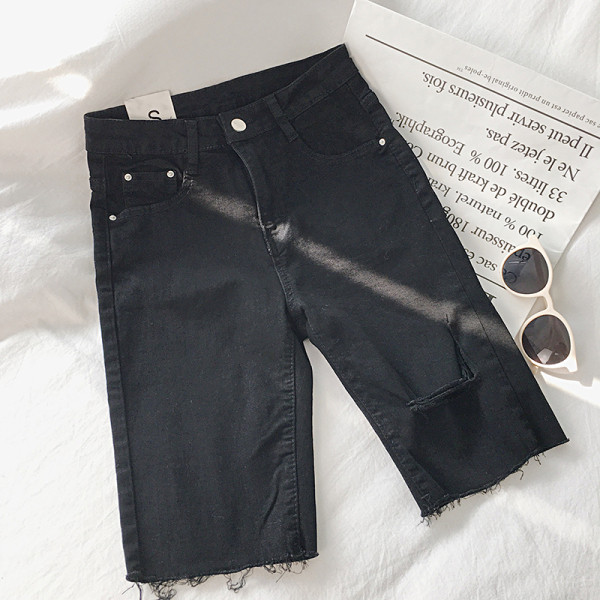 Női nadrág 3/4 hosszban, szakadt motívumokkal, két színben