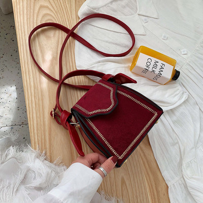 Väike naiste retrokott tikandi ja seemisnahaga