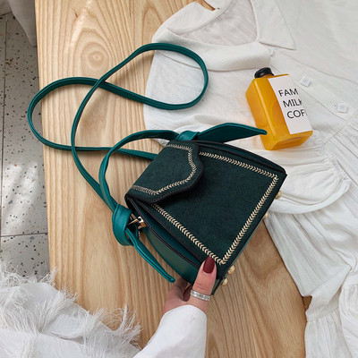 Väike naiste retrokott tikandi ja seemisnahaga