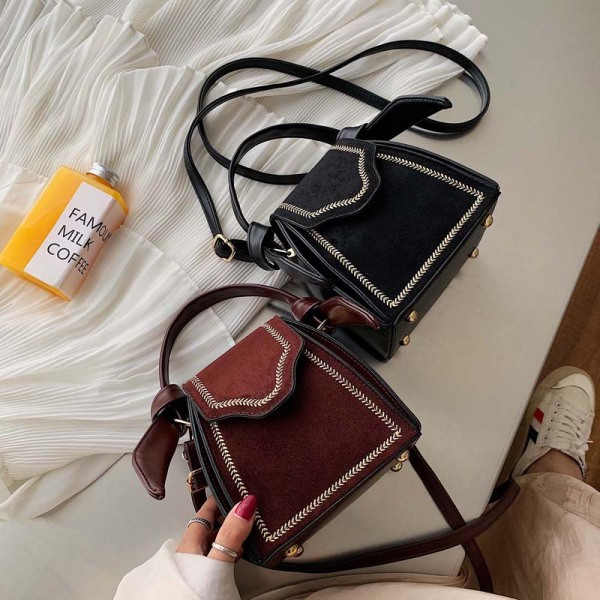 Väike naiste retrokott tikandi ja seemisnahaga