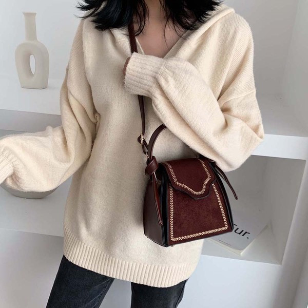 Väike naiste retrokott tikandi ja seemisnahaga