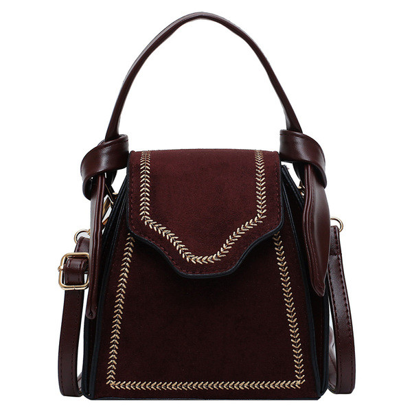 Väike naiste retrokott tikandi ja seemisnahaga