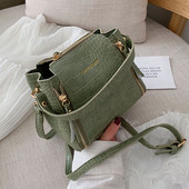 Модерна дамска кожена чанта с ципове