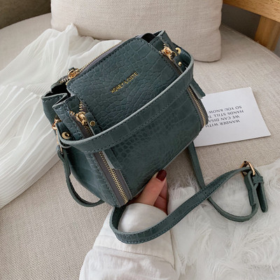 Модерна дамска кожена чанта с ципове