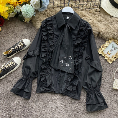 Uut mudelit lootosevarrukate, klassikalise krae ja kivikestega naiste särk