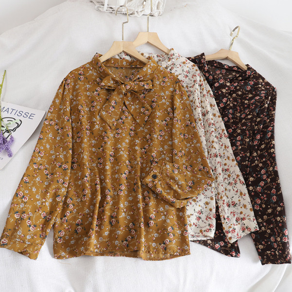 Modern női ing szalaggal és virágmintával retro stílusban