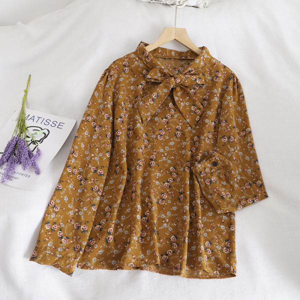 Modern női ing szalaggal és virágmintával retro stílusban