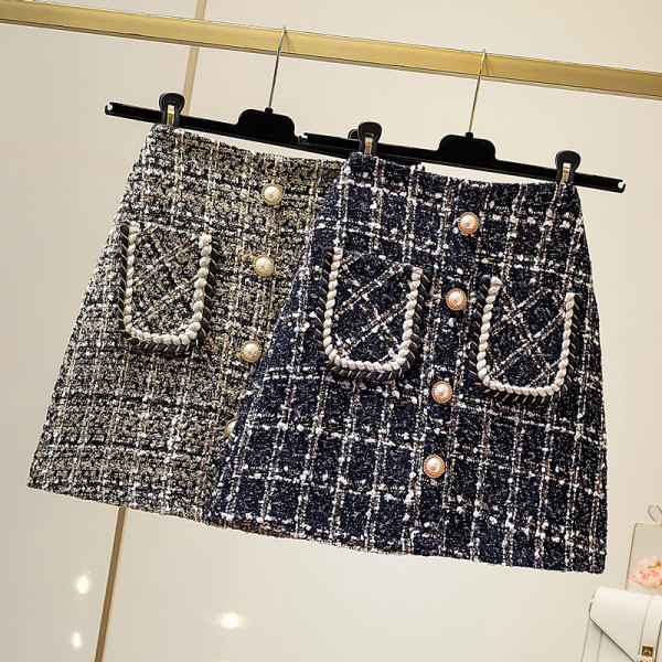 Stílusos női őszi-téli szoknya gombokkal és zsebekkel, magas derékkal