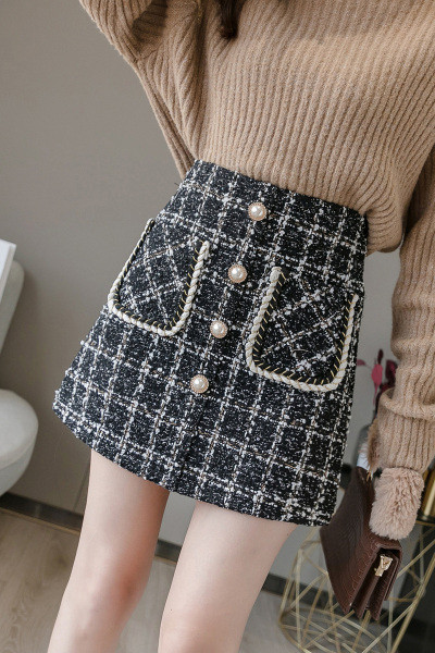 Модерна дамска карирана  пола с джобове в предната част и висока талия 