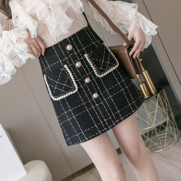 Модерна дамска карирана  пола с джобове в предната част и висока талия 