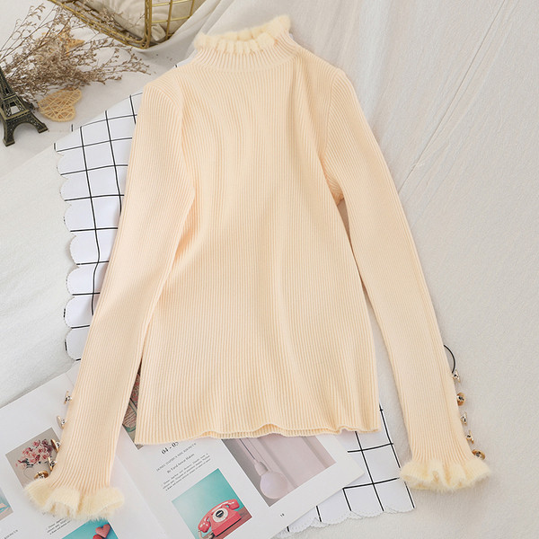 Κομψό γυναικείο πουλόβερ  με υψηλό γιακά και μανίκια