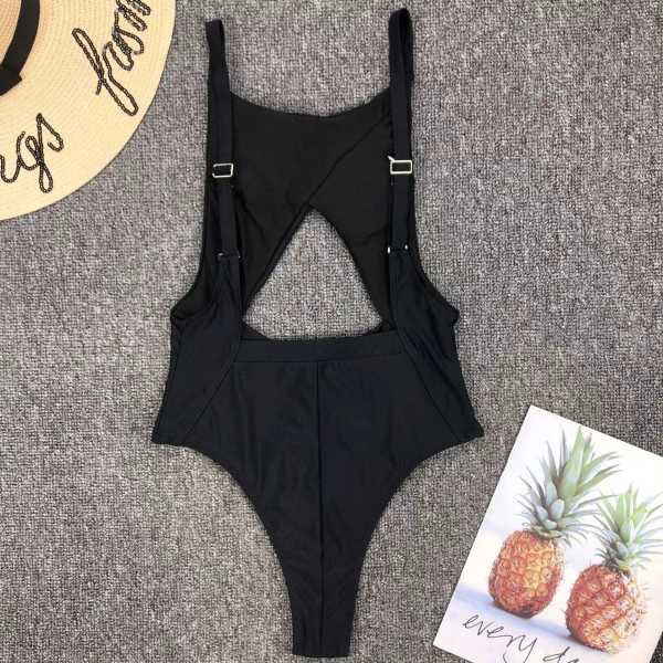 Черен цял бански с изрязани части, гол гръб и цип