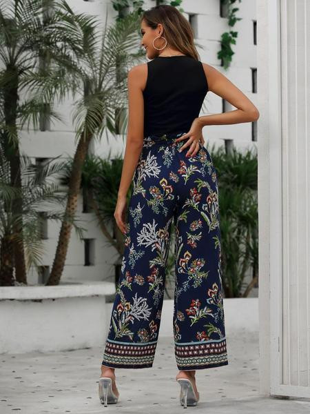 Új modell női nadrág övvel és virágmintával - egyenes modell