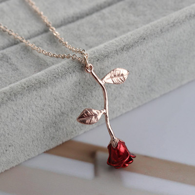 Gentle women`s necklace with a pendant - red rose