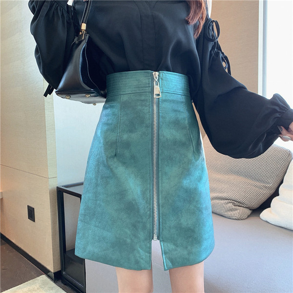 Aktuális női bőrszoknya elöl cipzárral, magas derékkal