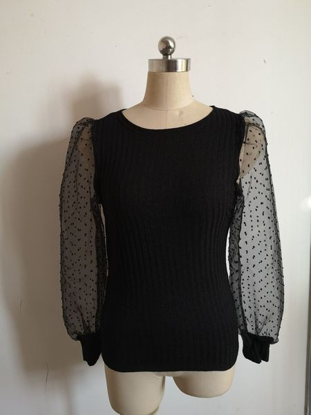 Uue mudeli naiste täpiliste varrukateta pluus