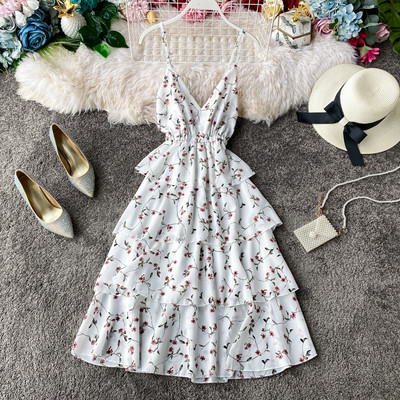 Šarena ženska haljina - sa tankim naramenicama i cvjetnim motivima