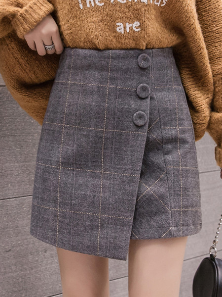 Naiste kõrge vöökoha ja nööpidega ruuduline seelik