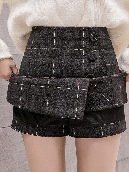 Naiste kõrge vöökoha ja nööpidega ruuduline seelik