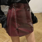 Női aszimmetrikus bőrszoknya, magas derékkal és cipzárral