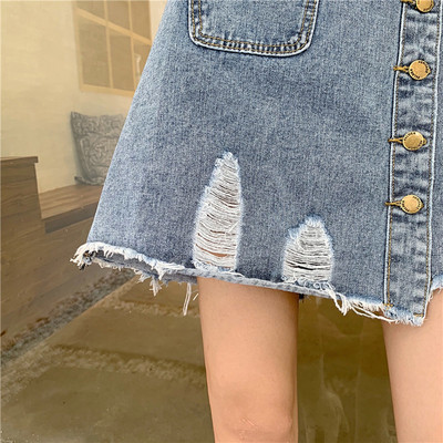 Új modell rövid farmerszoknya szakadt motívumokkal - A-vonal