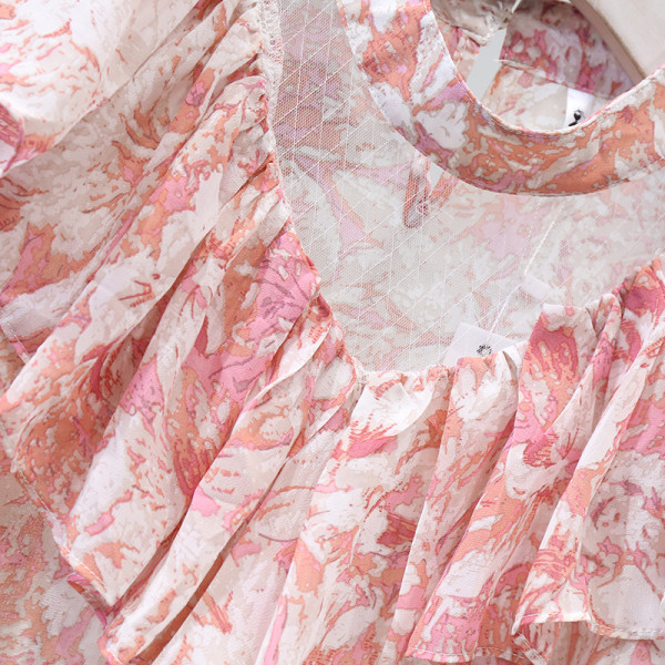 Modern női ing spitz nyakkivágással és virágmintával