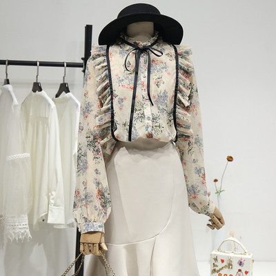 Μοντέρνο γυναικείο πουκάμισο με χαμηλό κολάρο και δεσμούς με ευρύ μοντέλο