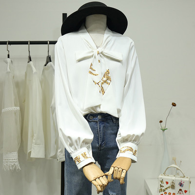 Moodne naiste särk paela, mustri ja pikkade varrukatega