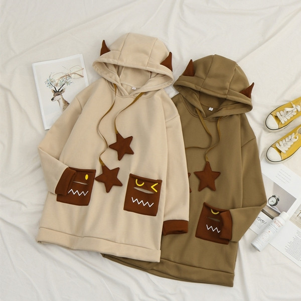 Naiste talvepikk dressipluus kapuutsi, taskute ja 3D elementidega