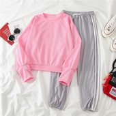 Naiste spordikomplekt - ovaalse kaelusega pluus ja ääristega püksid