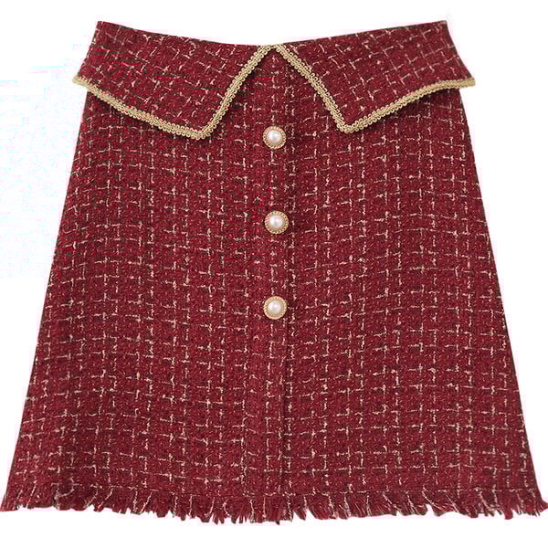 Modern női szoknya magas derékkal, gombokkal és rojtokkal