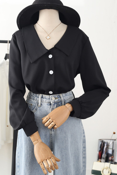 Uue mudeli nööpide, pikkade varrukate ja spitsikaelusega särk