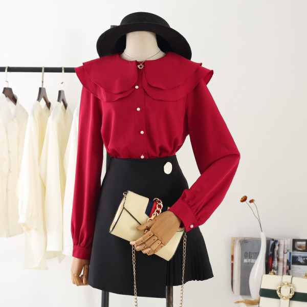 Modern női ing ovális nyakkivágással, gombokkal és hosszú ujjakkal